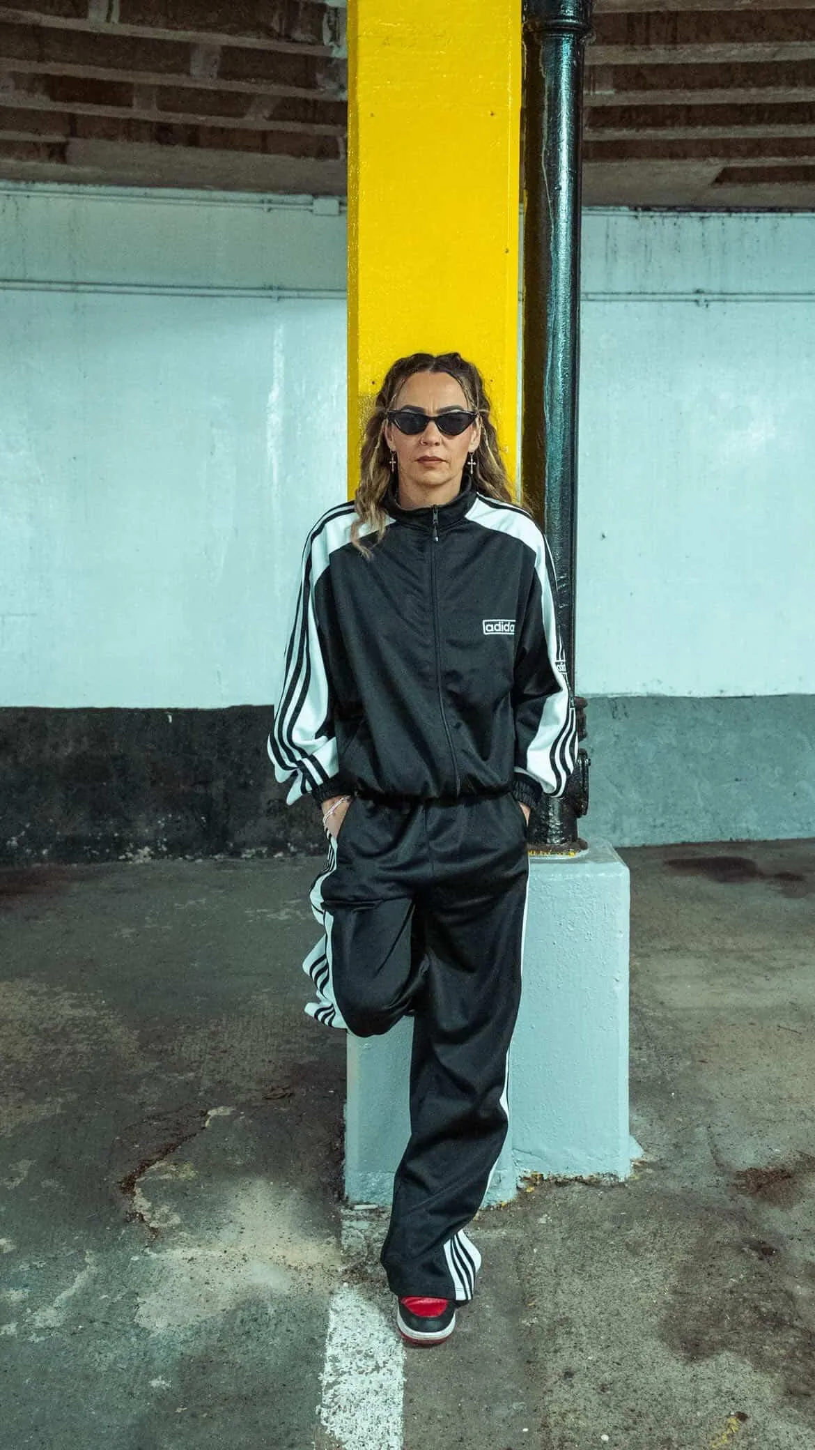 Amanda standing in a warehouse space